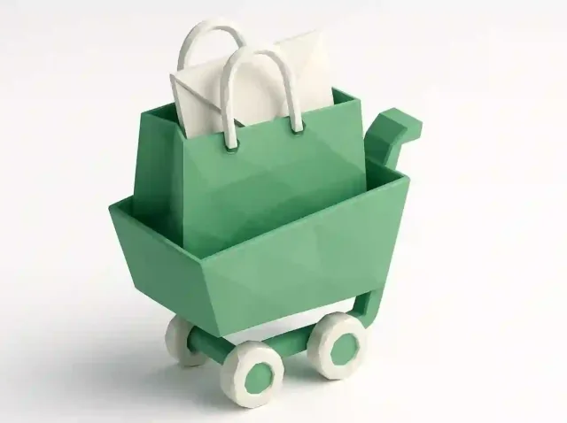 Kayıp satışları kurtarmak için Shopify terk edilmiş sepet e-posta otomasyonunu simgeleyen bir alışveriş çantası ve zarf içeren yeşil alışveriş sepeti (2026)
